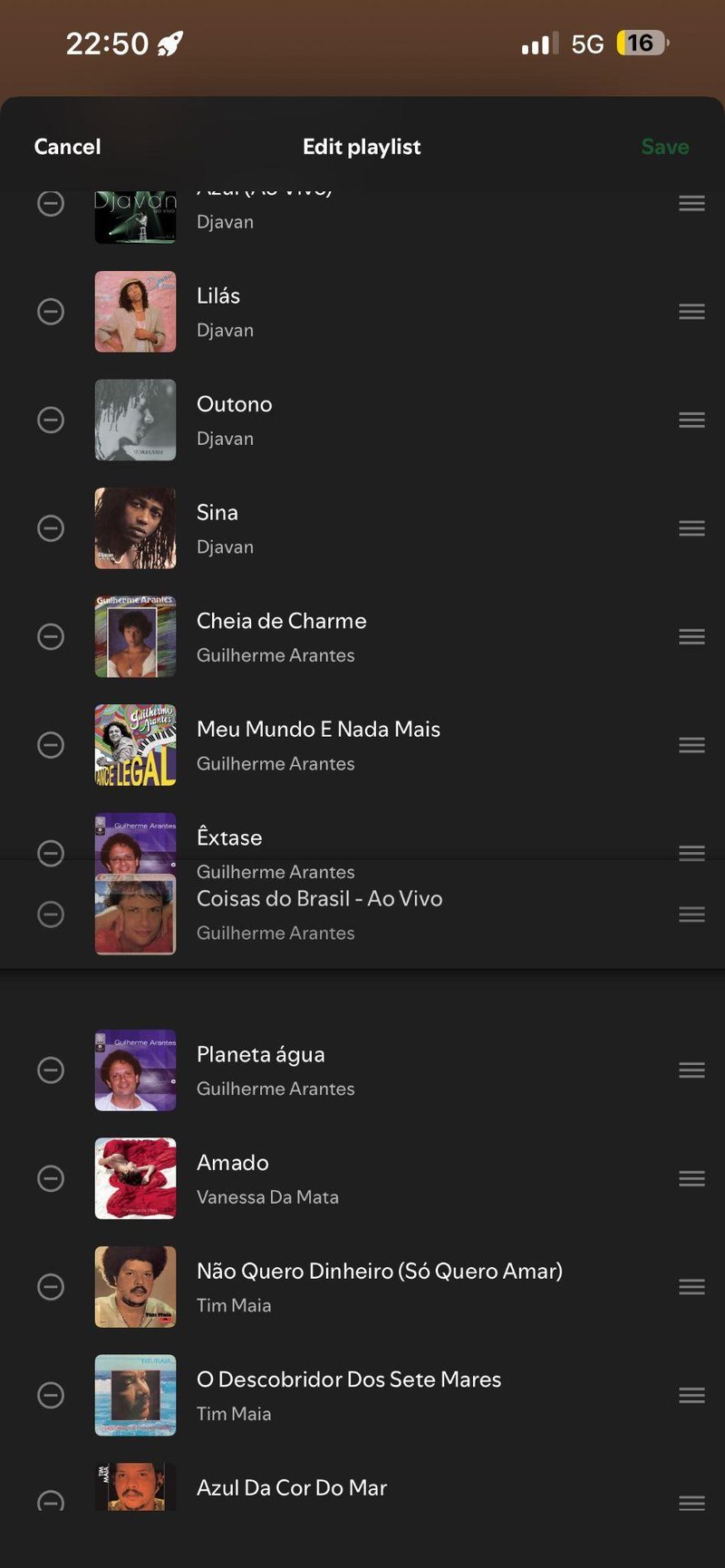 Tela de edição da playlist com handles de reordenação